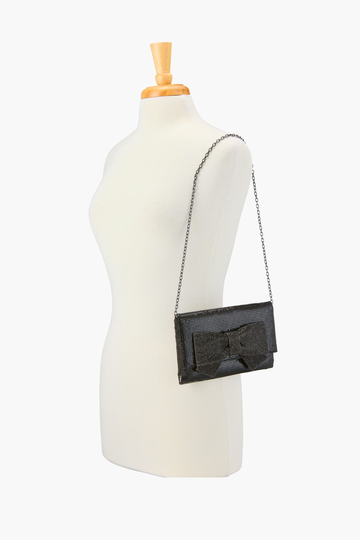 Bow Clutch in Black by Whiting and Davis - RENTAL